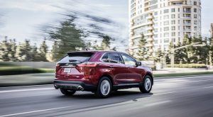 side view of a red 2019 Ford Edge