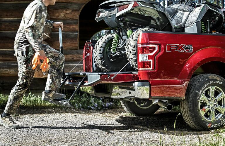 rear tailgate of a red 2020 Ford F-150