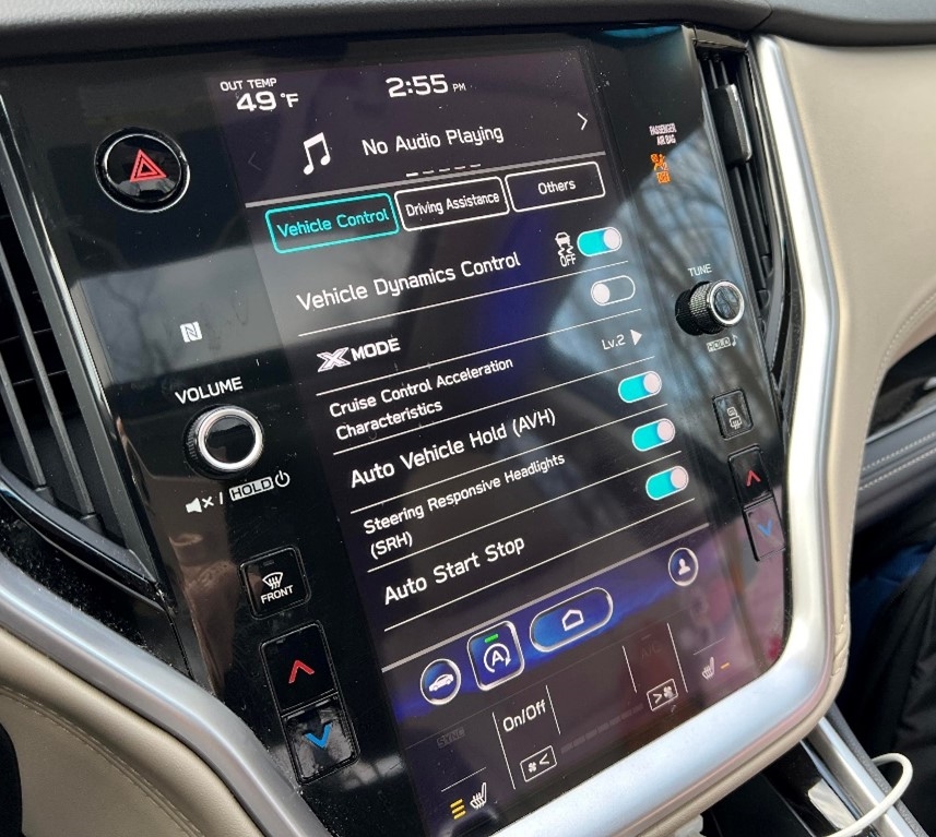 A close-up on the dashboard info screen inside a Subaru vehicle.