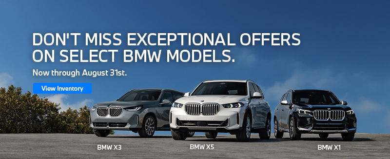 BMW X3, X5, & X1 parked on the street