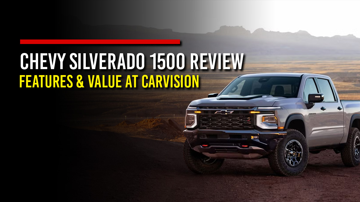 Silver Chevrolet Silverado ZR2 pickup truck with off-road tires parked on a desert plain with mesas in the background, next to the headline “Chevy Silverado 1500 Review, Features & Value at CarVision”