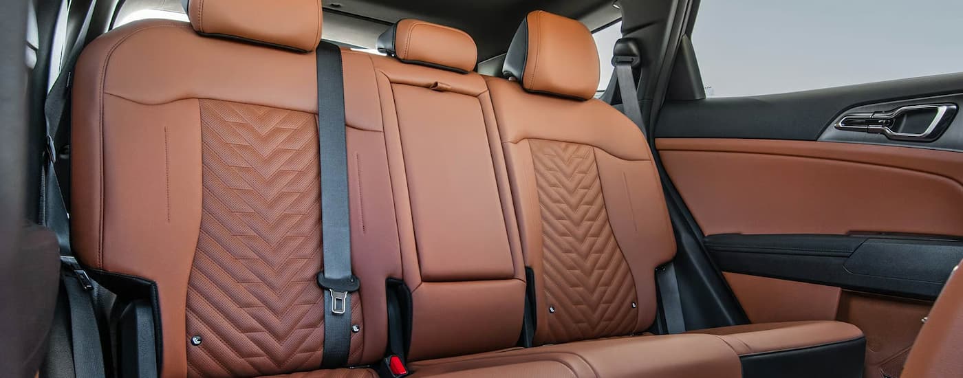 Brown leather rear seats in a 2026 Kia Sportage Hybrid