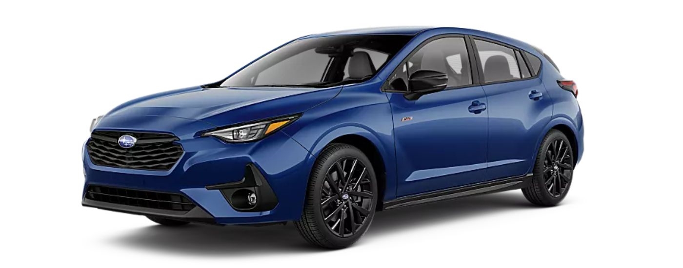 Blue 2026 Subaru Impreza angled left.