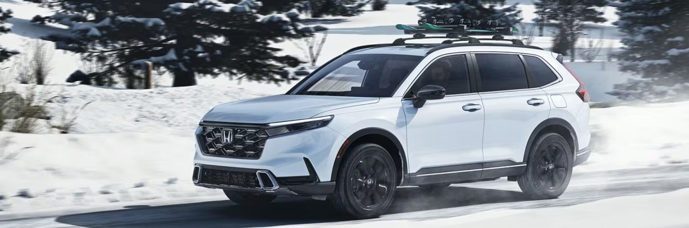 2025 Honda CR-V Hybrid Sport Touring Hybrid in Platinum White Pearl