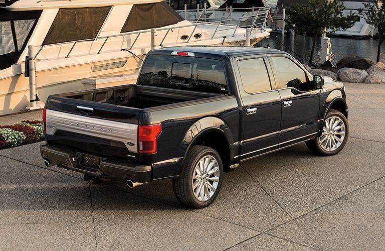 side view of a black 2021 Ford F-150 Limited