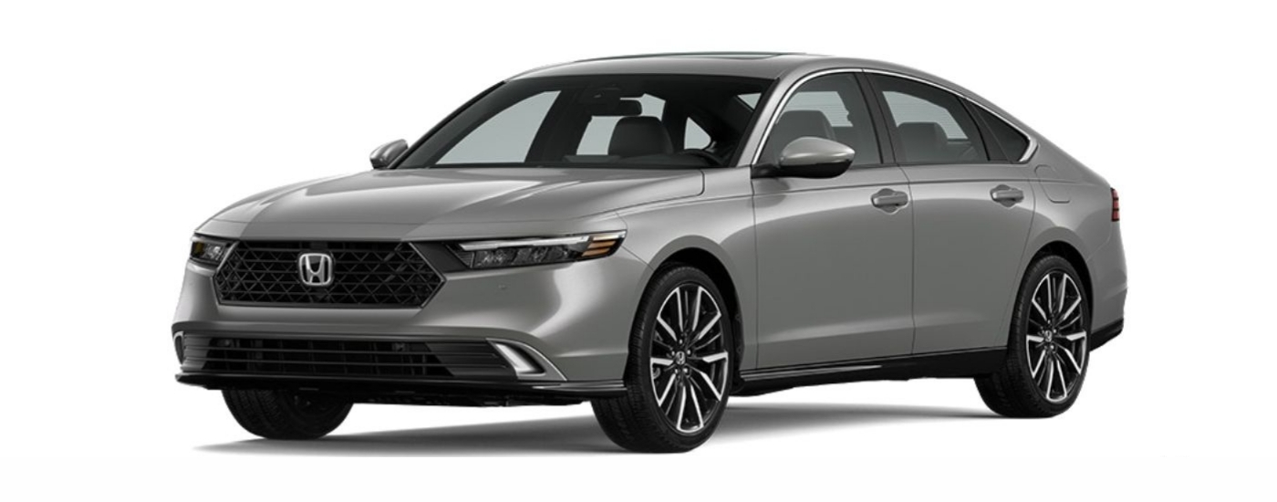 A silver 2023 Honda Accord Hybrid Touring is angled left.