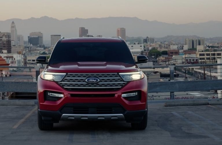 Red 2024 Ford Explorer Limited on Top Level of a Parking Ramp