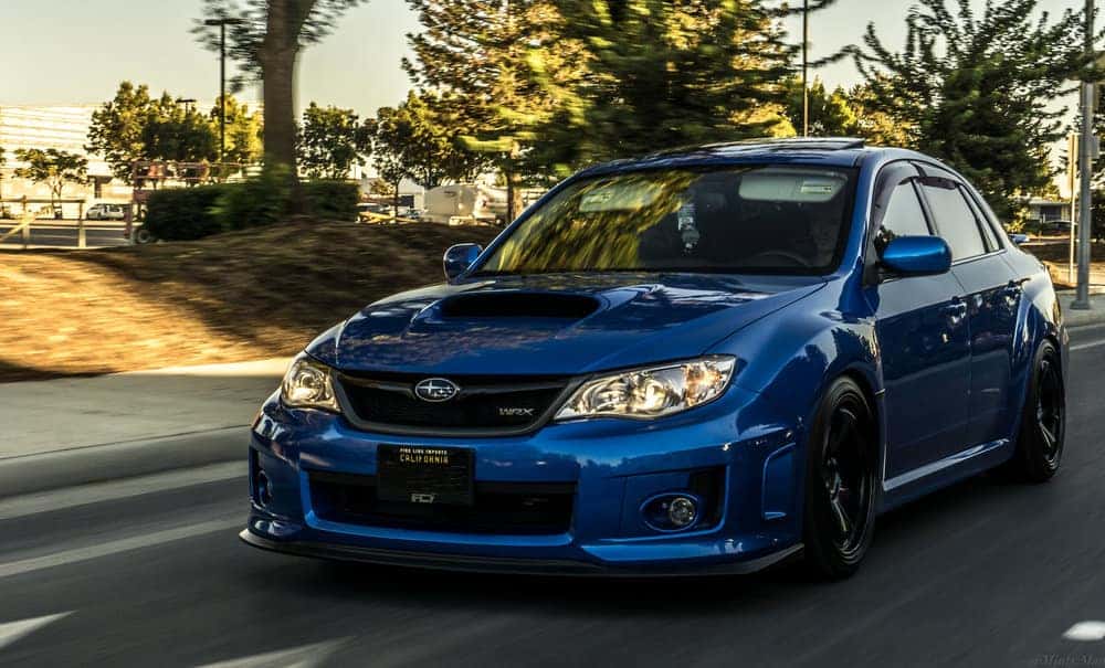 Blue Subaru Impreza WRX STI sedan from the 2008-2014 generation