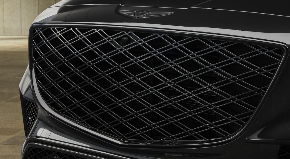 Front grille of a Prestige Black 2027 Genesis GV80.