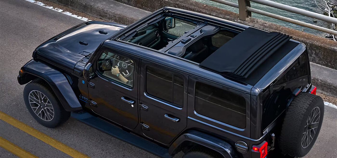 2024 Jeep Wrangler 4xe driving on a road