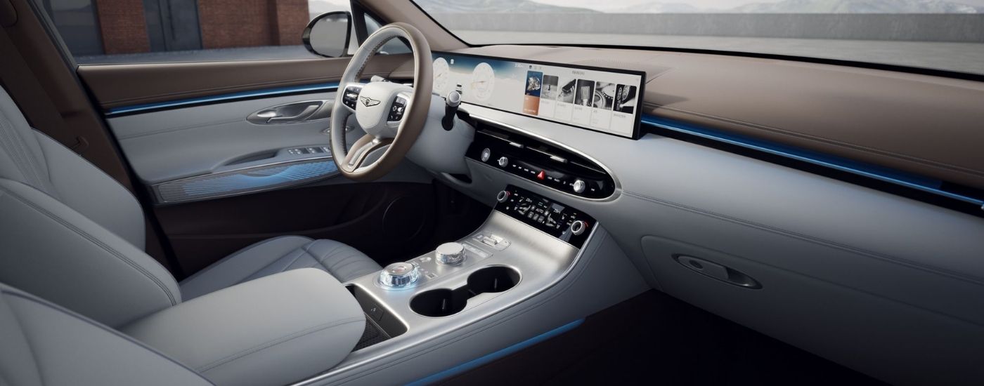 Infotainment and digital gauge cluster on a Genesis GV70 for sale