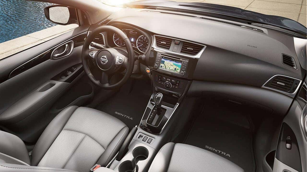 2017 Nissan Sentra dashboard with touchscreen and gray leather seats