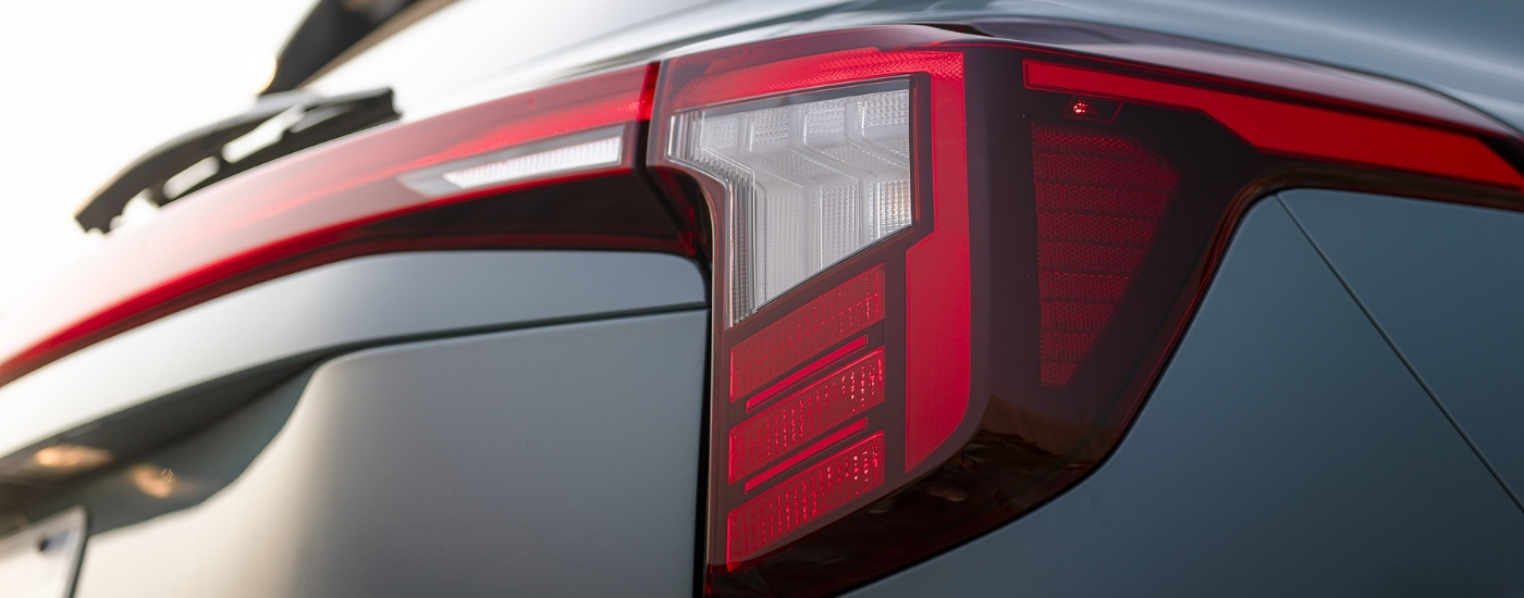 Close-up of the brake light on a blue 2025 Kia Seltos SX