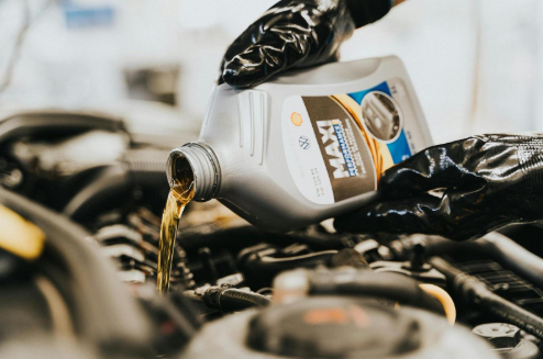 Close up on a GMC vehicle oil change in Kirksville, MO.