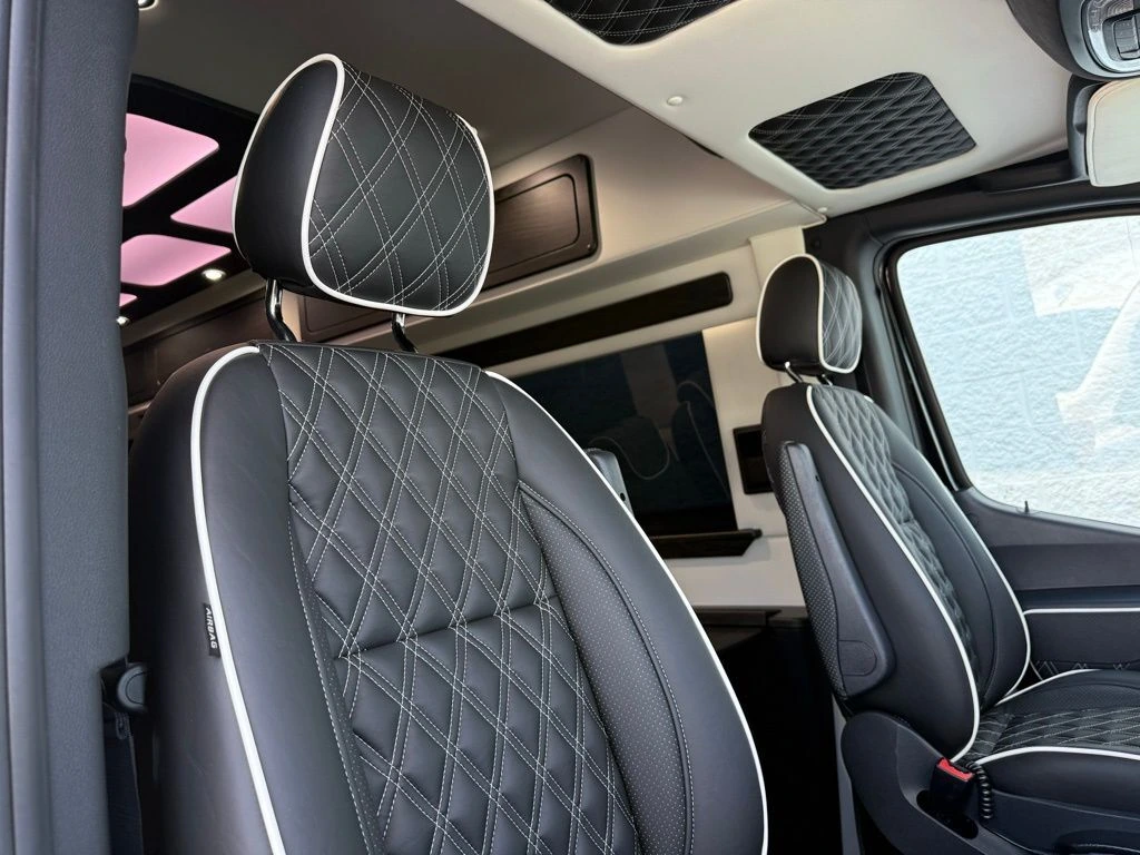 Discovery Touring interior — luxury Sprinter van cabin