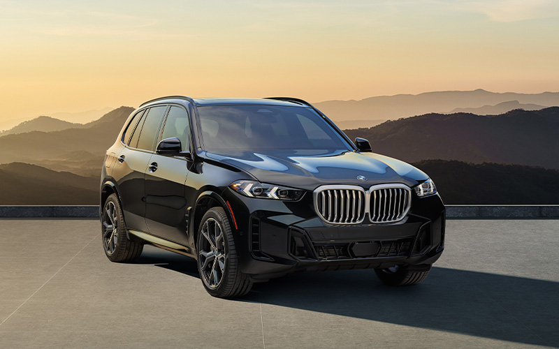 BMW X3 parked near seaside.