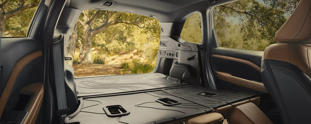 2026 Subaru Forester Cargo Area with 60/40-Split Flat-Folding Rear Seatbacks Shown with Accessory Eq…