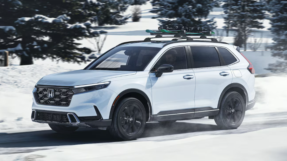 2025 Honda CR-V Hybrid in white running with side view-Feature