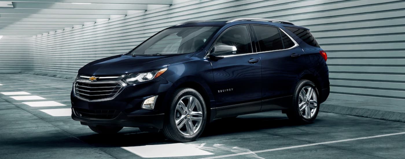 Blue 2020 Chevy Equinox parked in a parking lot