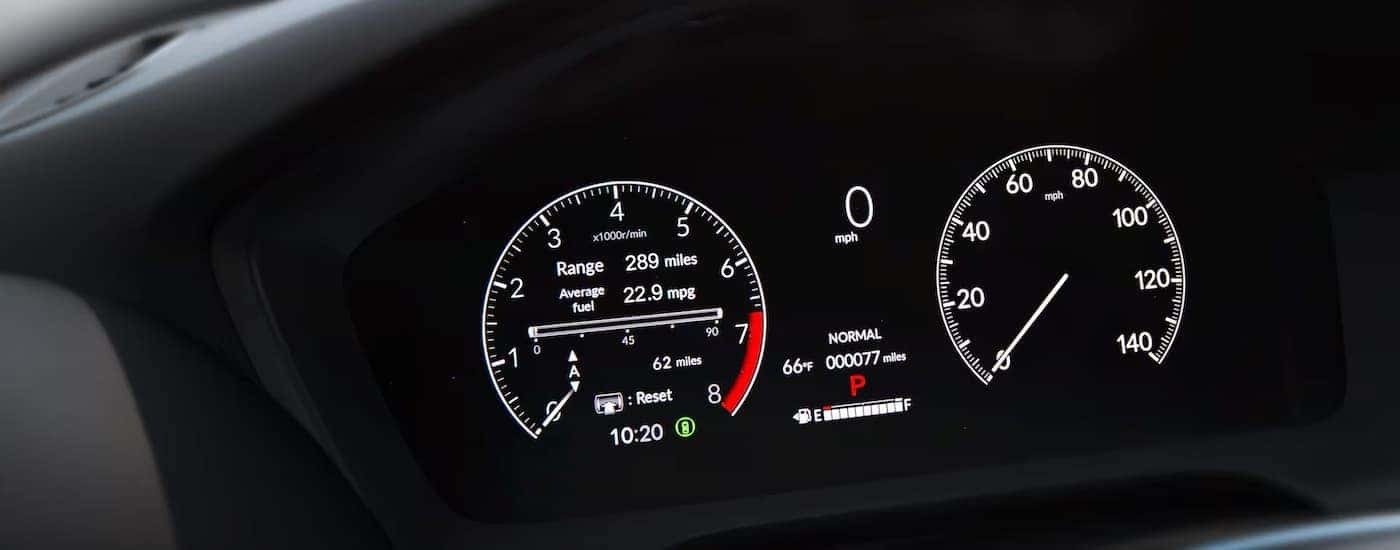 The illuminated digital cluster in a 2025 Honda HR-V EX-L.