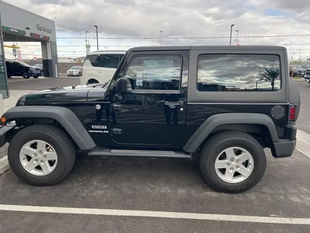 Used 2015 Jeep Wrangler Sport with VIN 1C4AJWAG3FL679916 for sale in Las Vegas, NV