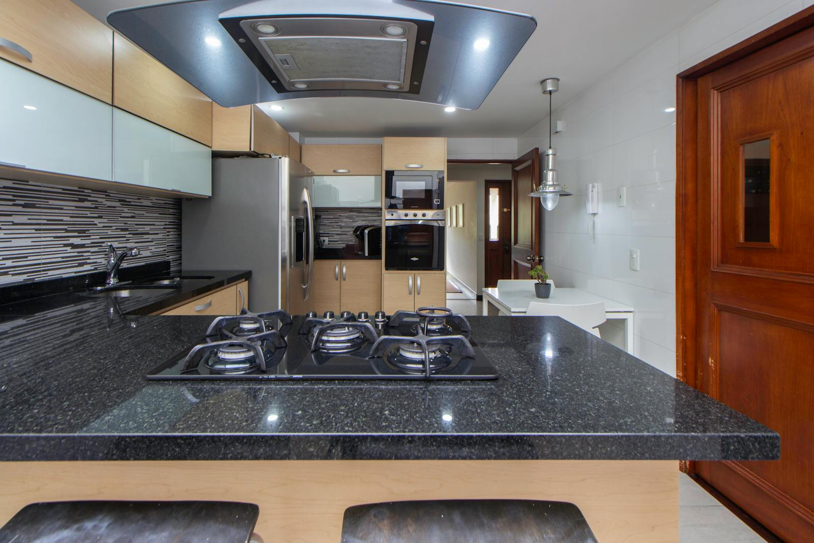 Customer reviewing auto financing options at dealership near Thomson IL