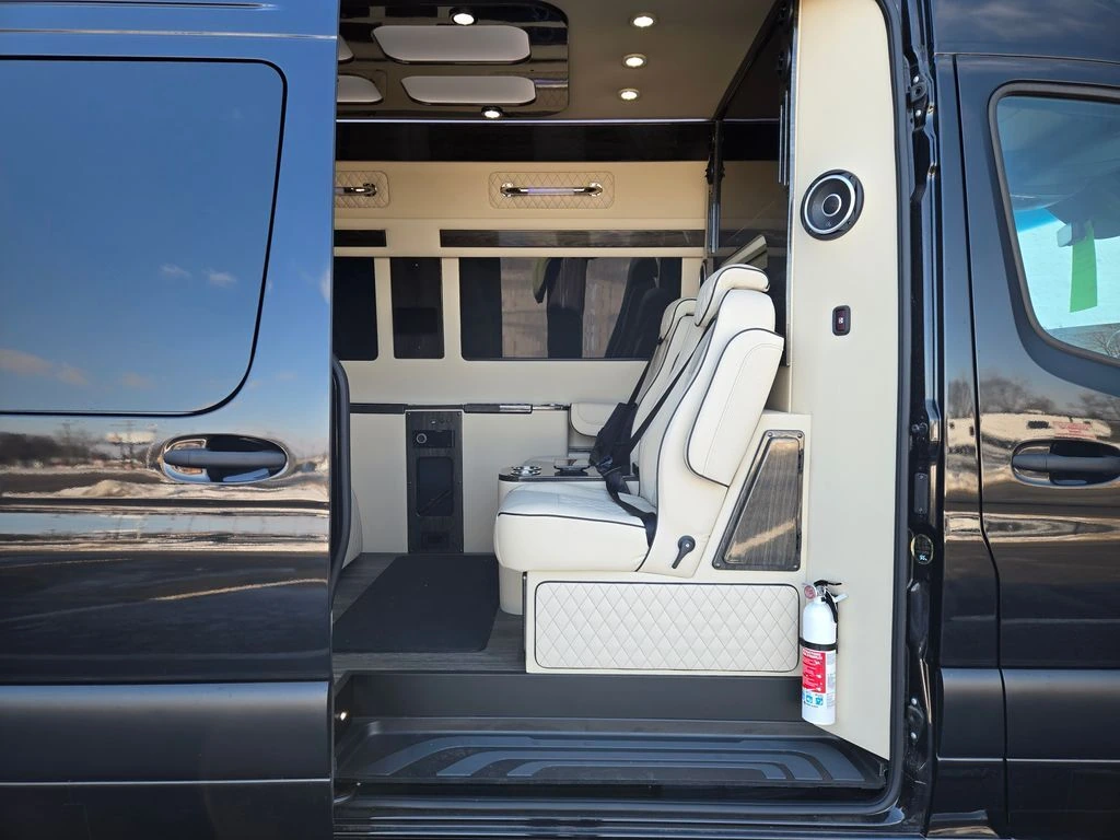 Discovery Touring interior — luxury Sprinter van cabin