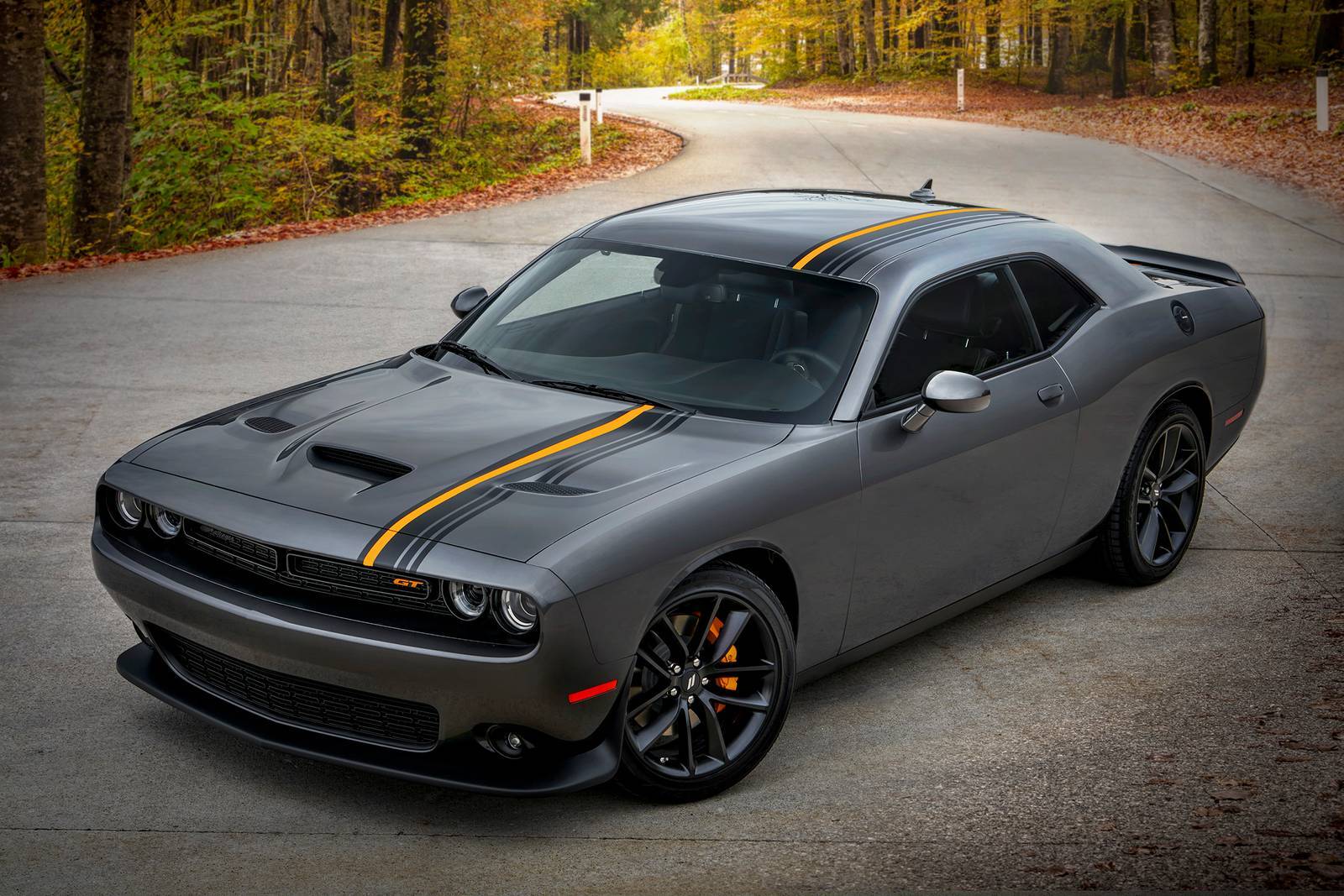A gray car sitting parked.