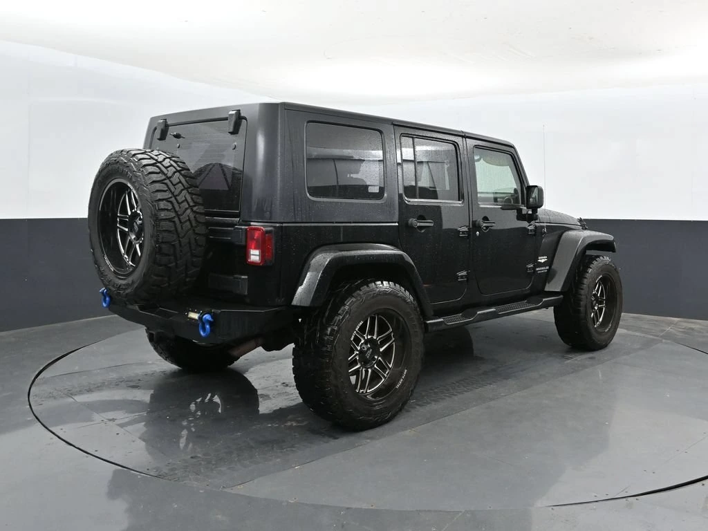 Used 2008 Jeep Wrangler Unlimited Sahara with VIN 1J4GA59148L540895 for sale in East Moline, IL