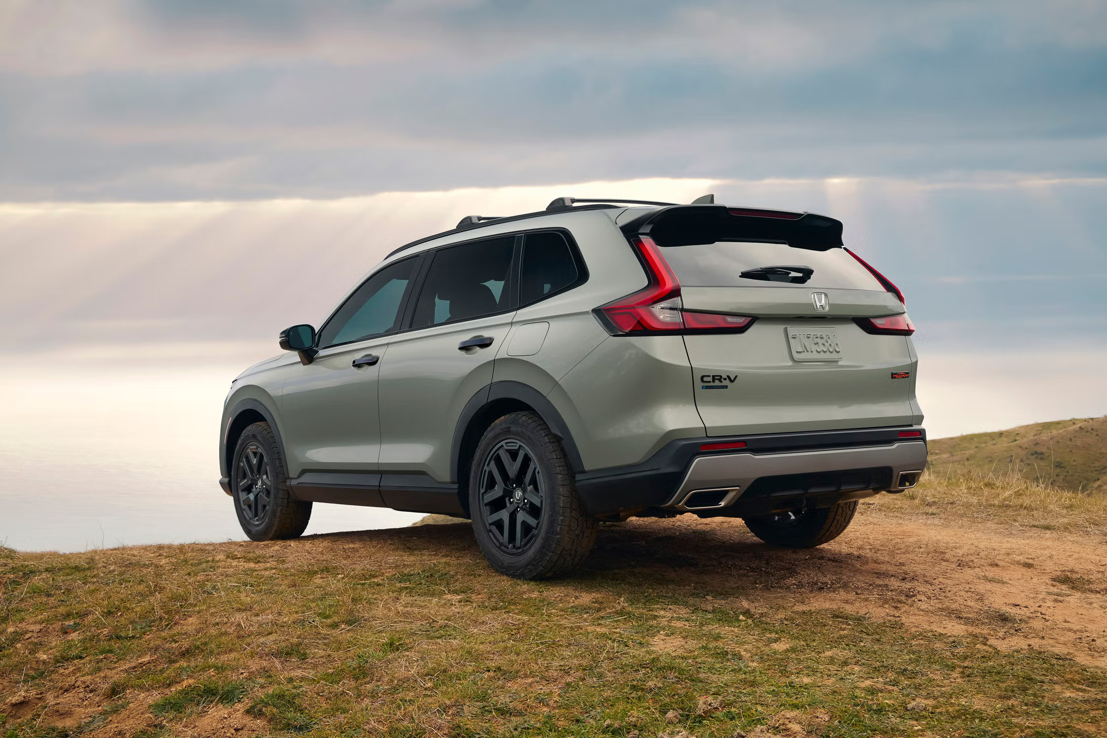 New 2027 Honda CR-V Sport Touring Hybrid in Radiant Red Metallic