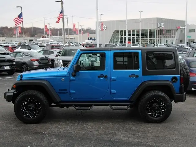 Used 2015 Jeep Wrangler Unlimited Sport with VIN 1C4BJWDG3FL756185 for sale in Kansas City