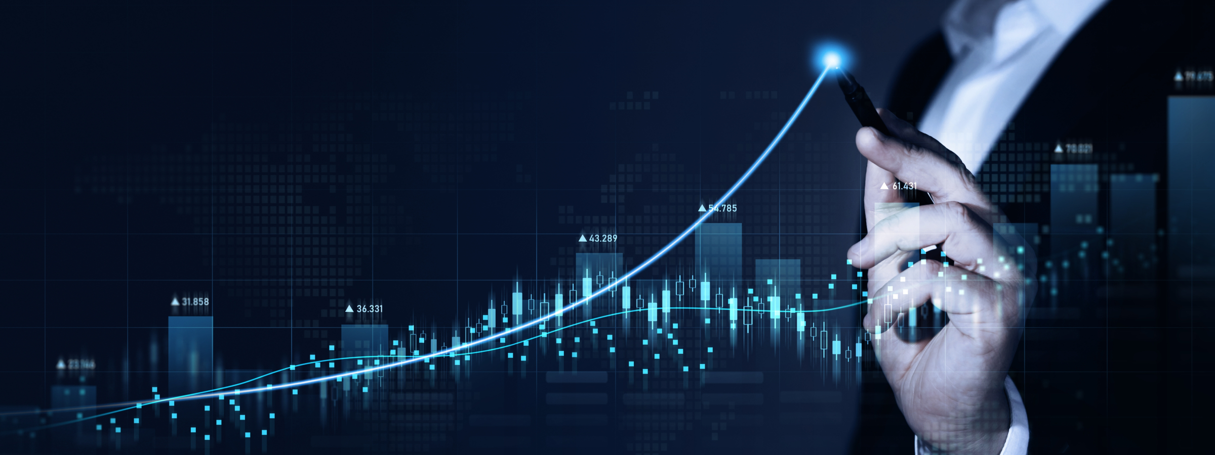 Hand pointing at a rising sales growth chart