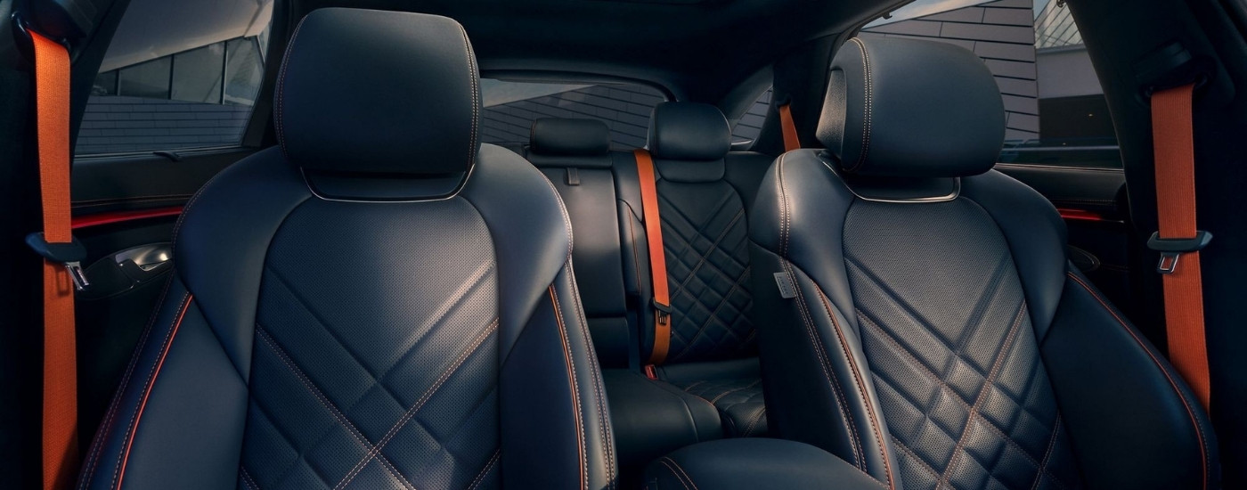 Black and orange leather seating in a 2026 Genesis GV70
