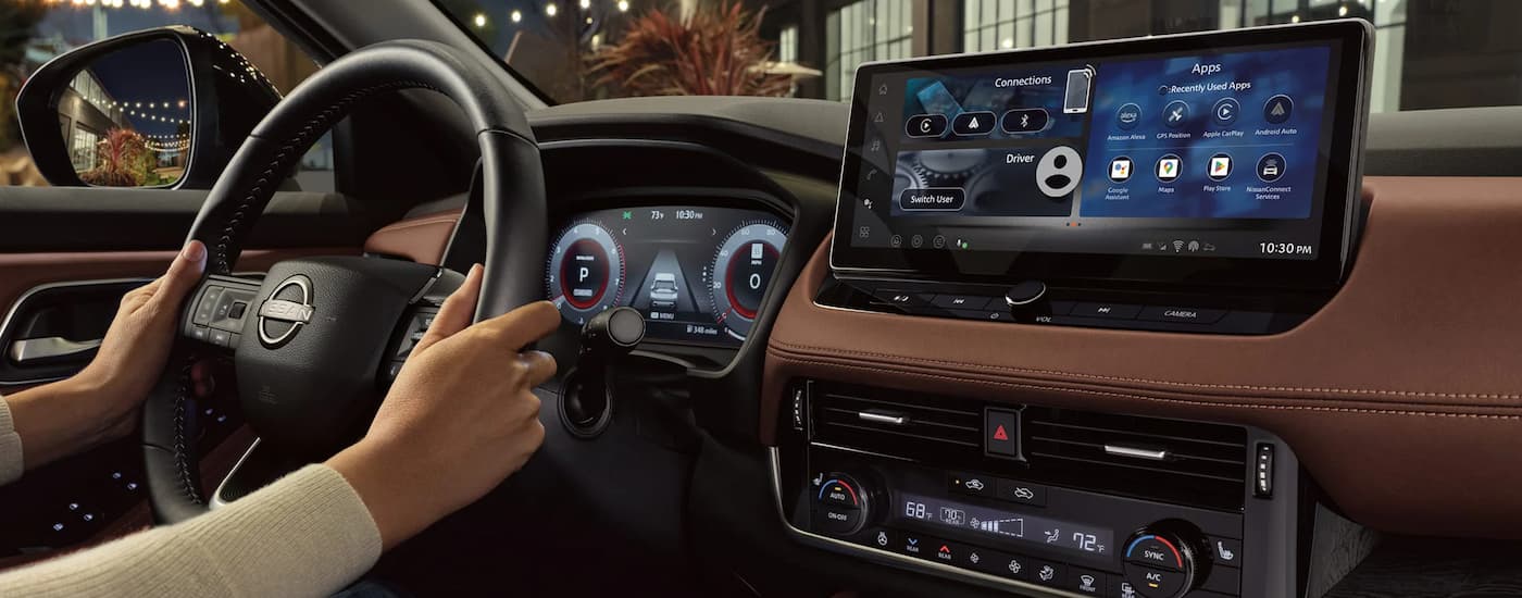 Infotainment screen and steering wheel in a 2026 Nissan Rogue