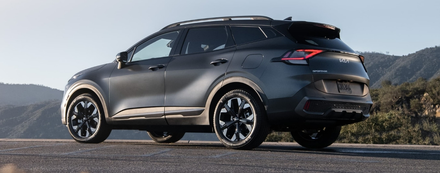 Grey 2023 Kia Sportage for sale in Glendale parked near mountains