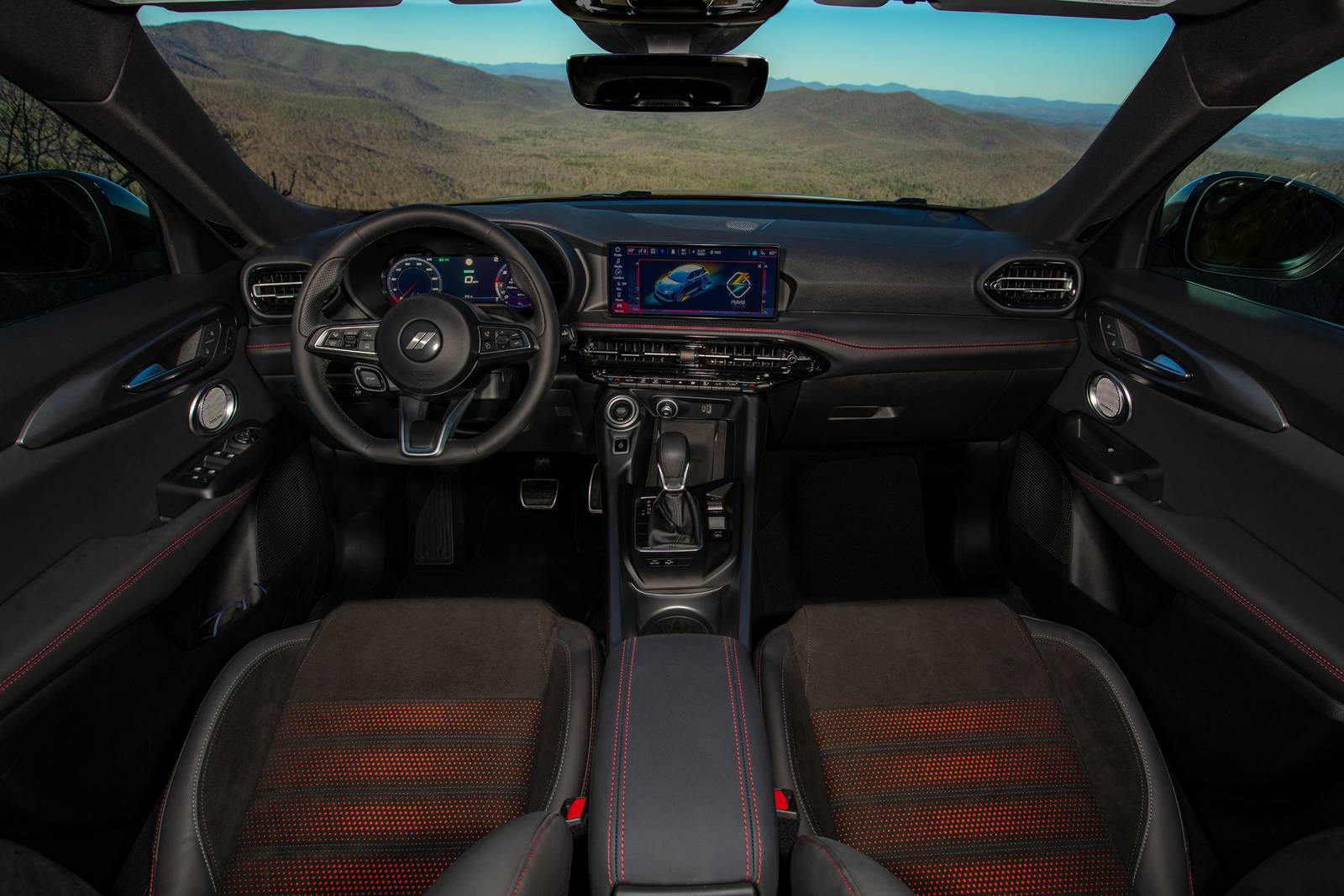 The front interior of a dodge hornet.