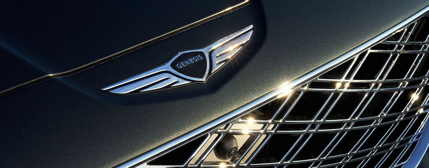 Grille on a green 2026 Genesis GV80