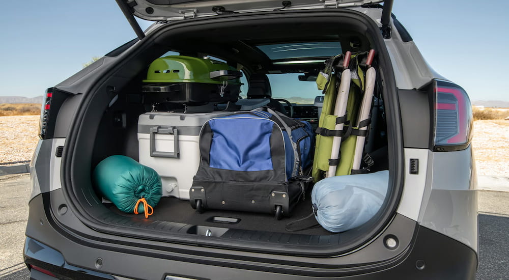 Objects in the hatch of a silver 2026 Kia Sportage.