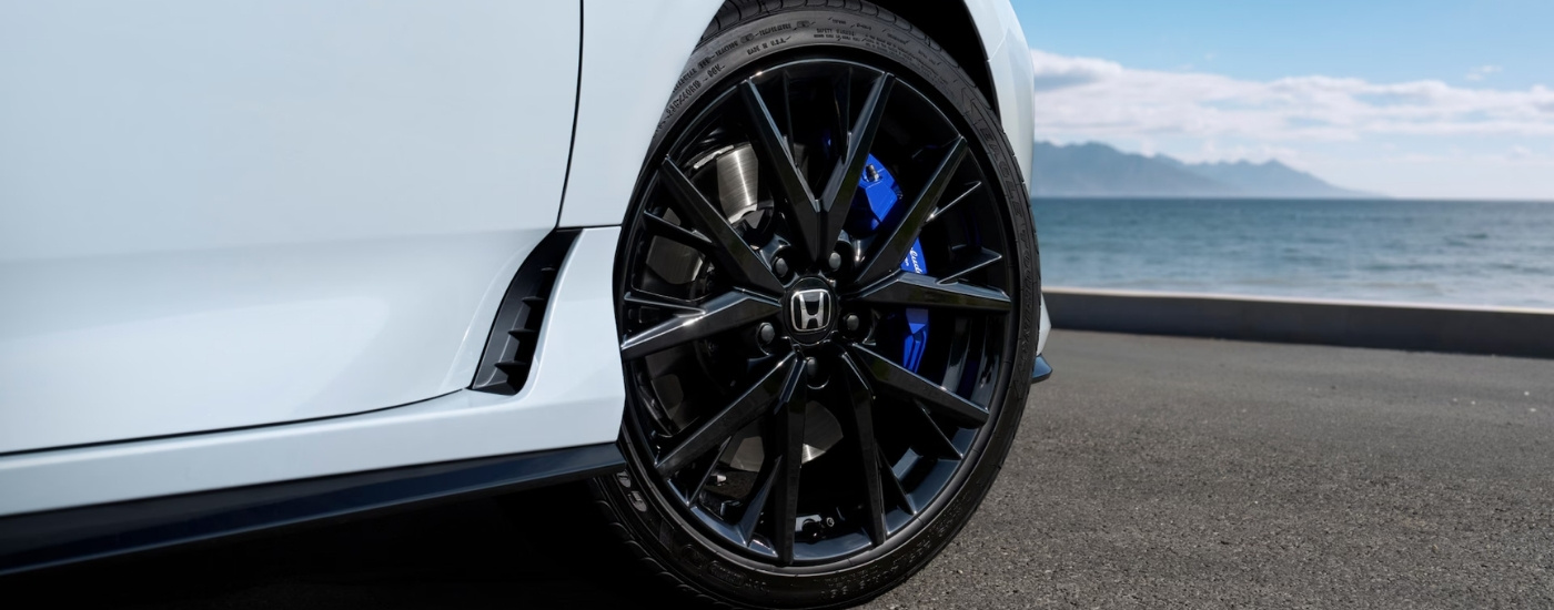 Front passenger rim on a white 2026 Honda Prelude