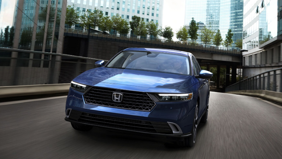 2025 Honda Accord Hybrid in blue running with front view-Feature