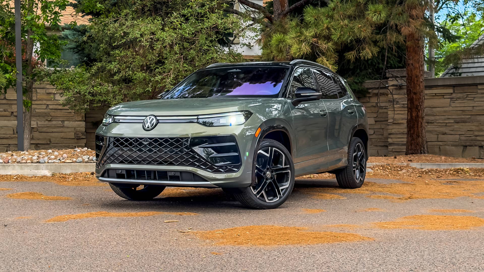 2027 Volkswagen Tiguan R-Line in green parked by a river