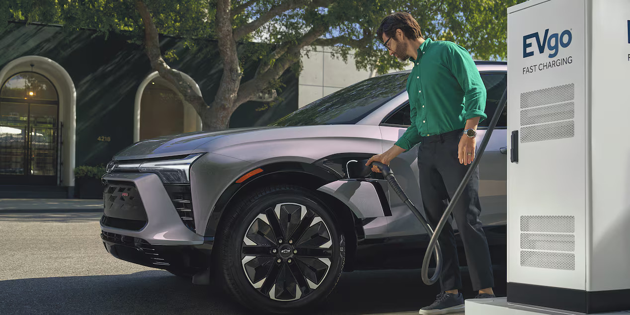 A man charging the 2024 chevy blazer ev.