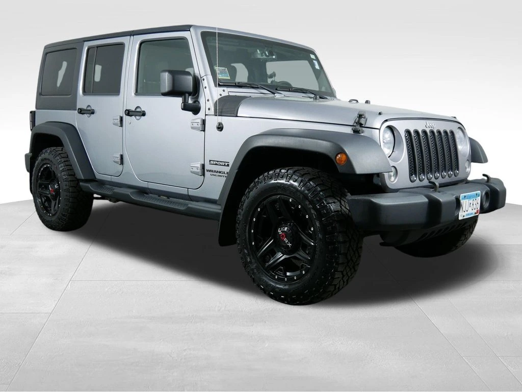 Used 2014 Jeep Wrangler Unlimited Sport with VIN 1C4BJWDG3EL263797 for sale in Brooklyn Park, Minnesota
